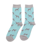 A pair of crew socks in light blue with a repeating pattern of greyhound dog silhouettes and grey cuffs, heels, and toes.